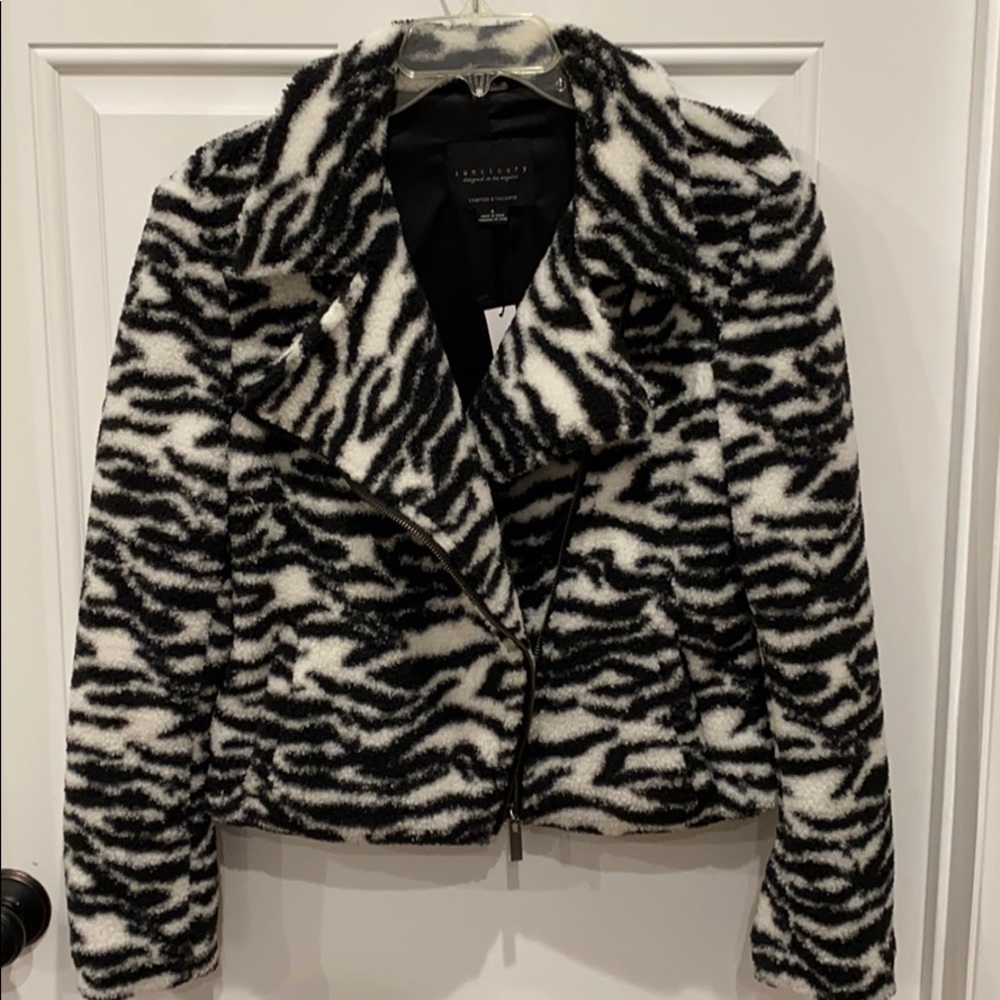 Warm and cozy animal print moto jacket. NWT